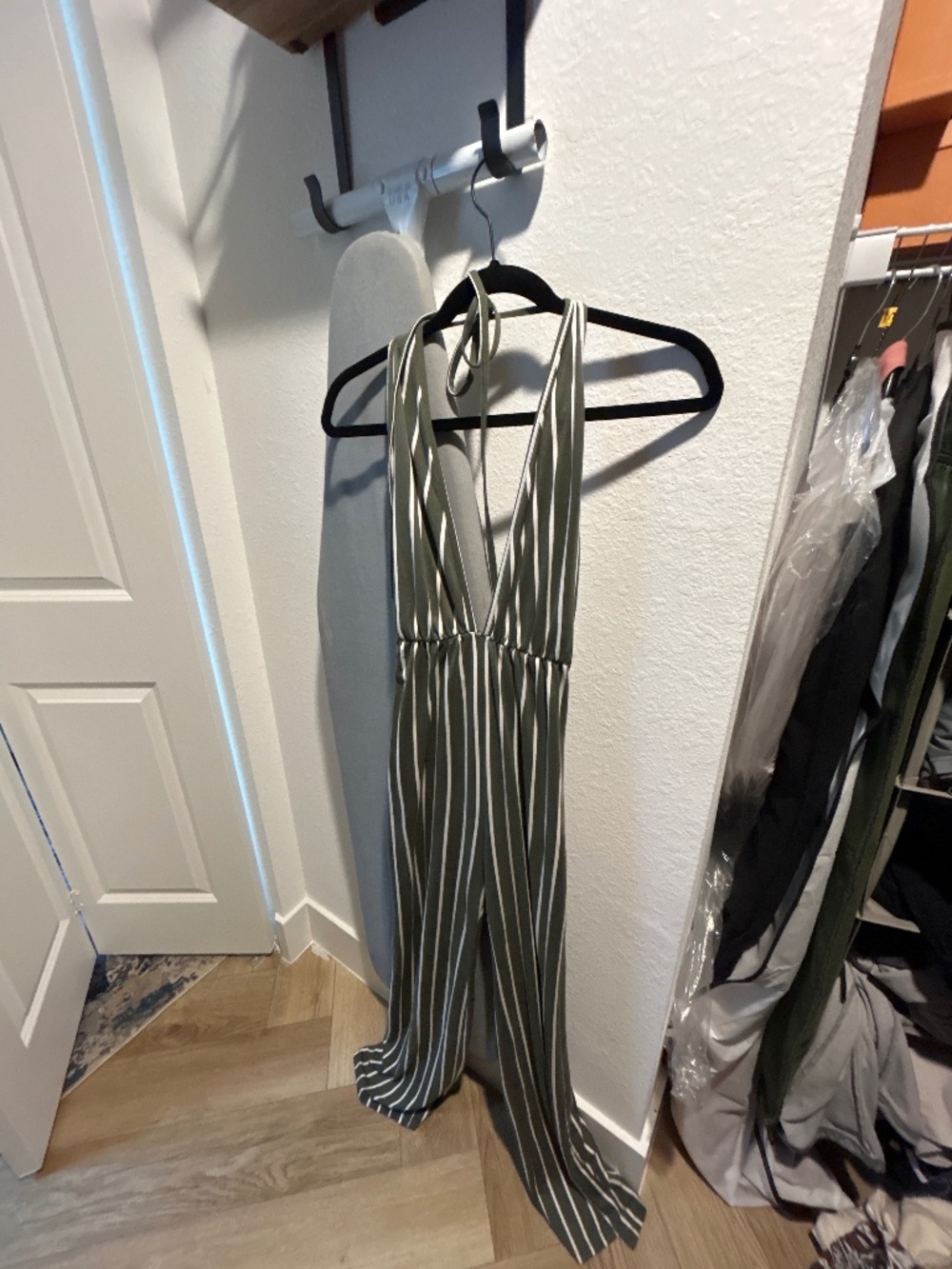 Green striped halter jumpsuit